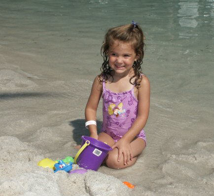 Maddy playing in the sand
