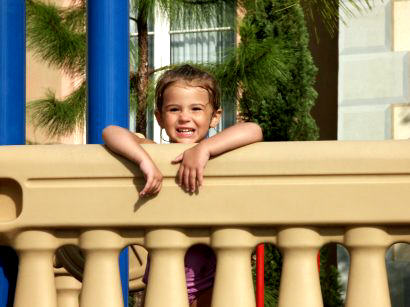 Playing on the large kids water boat
