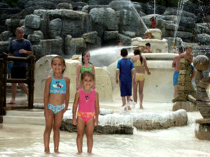 Playing near the water boat