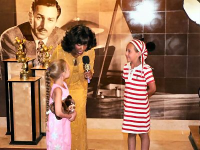 Mik and Brinn at a Golden Mickey interview