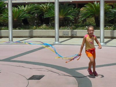Playing with streamers left by the characters