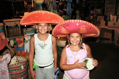 Trying on hats in Mexico