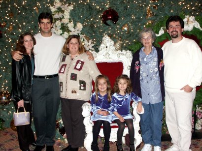 After dinner the family gathered around the GF Tree