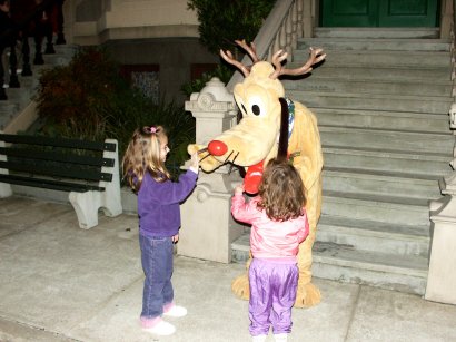 Maddy gives Rudolph Pluto's tongue a pull