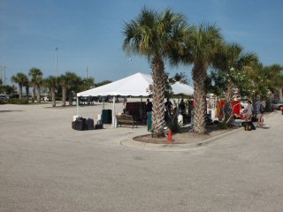 Tent for luggage pickup/dropoff across from the port