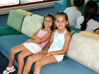 waiting to board watching some cartoons