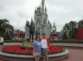 Dave, Kristen, Walt and Mickey in front of Castle